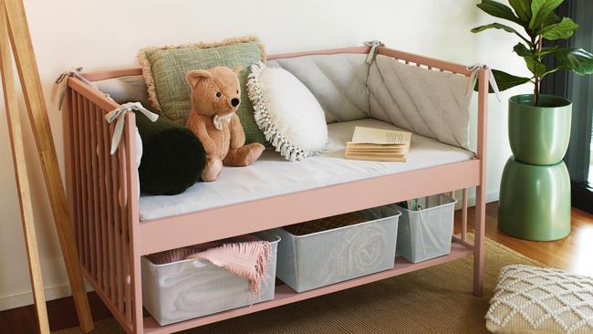 A cot can be upcycled into a small couch. Picture: Bunnings / Belinda Merrie