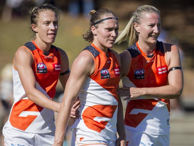 GWS Giants celebrate their win during the Round 5 AFLW match between the Fremantle Dockers and the Greater Western Sydney (GWS) Giants at Fremantle Oval in Fremantle, Saturday, March 3, 2018. (AAP Image/Tony McDonough) NO ARCHIVING, EDITORIAL USE ONLY