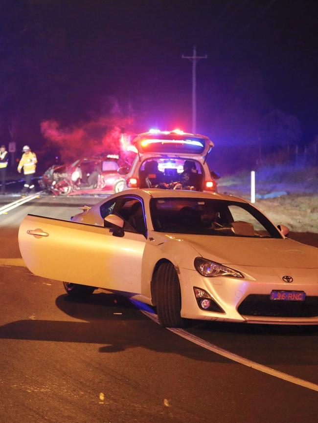 The driver of the white car was stopped after attempting to make a right hand turn into the scene of the accident. 