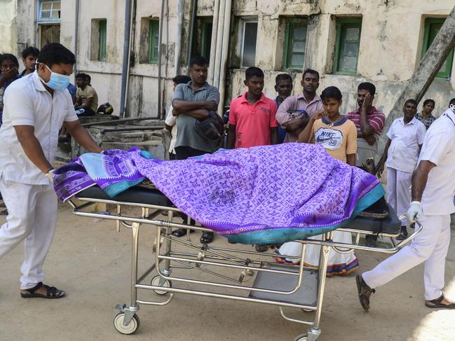 Sri Lankan hospital workers transport a body on a trolley at a hospital morgue following an explosion at a church in Batticaloa in eastern Sri Lanka on April 21, 2019. Picture: AFP