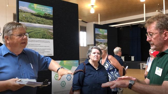 Dr Jorma Ahokas, left, speaks with Lendlease staff at a public meeting in 2021 about the treatment plant and how it would operate. Picture: Judith Kerr