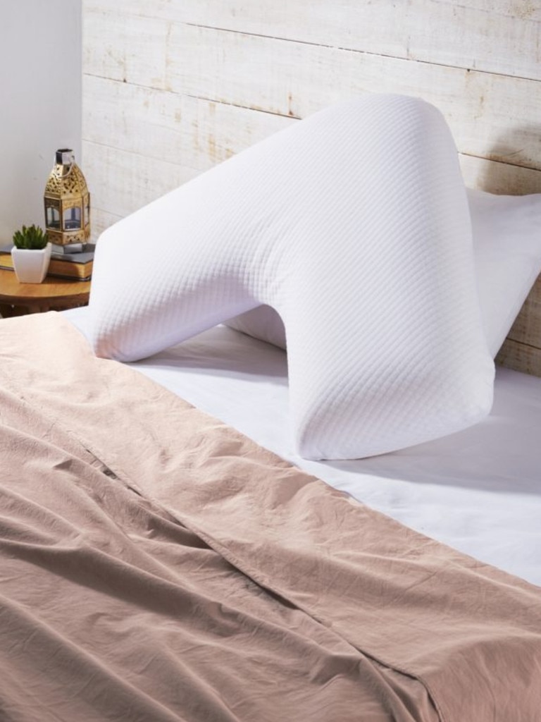 This V-shaped memory foam pillow, designed for maximum comfort, is available for $39.99. Picture: Supplied/Aldi