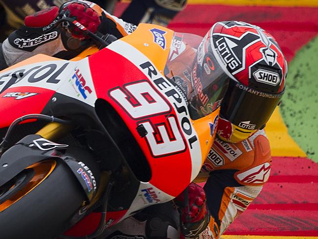 Repsol Honda's Spanish rider Marc Marquez competes in the MotoGP race Aragon Grand Prix at the Motorland racetrack in Alcaniz on September 28, 2014. AFP PHOTO/ JAIME REINA