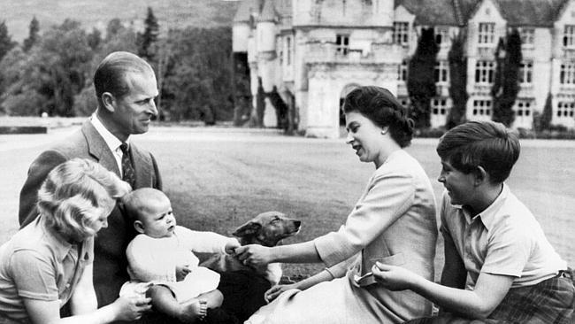 The Queen and Prince Philip relax at Balmoral in 1960 with Princess Anne, Prince Charles and the new-born Prince Andrew.