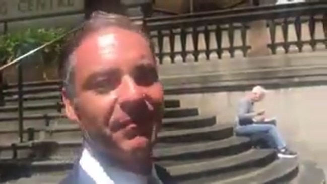 Andrew O'Keefe faces a reporter's questions as he leaves Sydney court