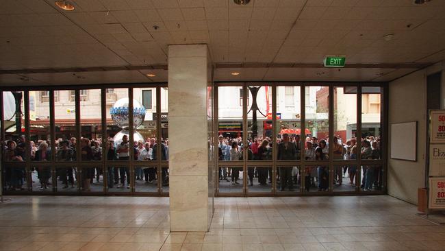 A massive crowd waiting for doors to open on the final day of trading before the closure of John Martin’s department store.