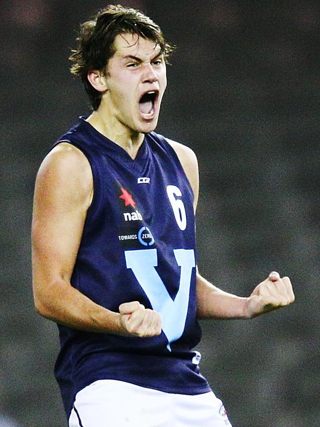 Curtis Taylor celebrates a goal for Vic Metro.