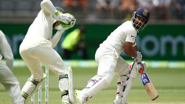 Tim Paine removes India’s Ajinkya Rahane off the bowling of Nathan Lyon in the second Test in Perth. Picture: Getty Images 