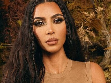 Kim K poses in nude-looking lingerie