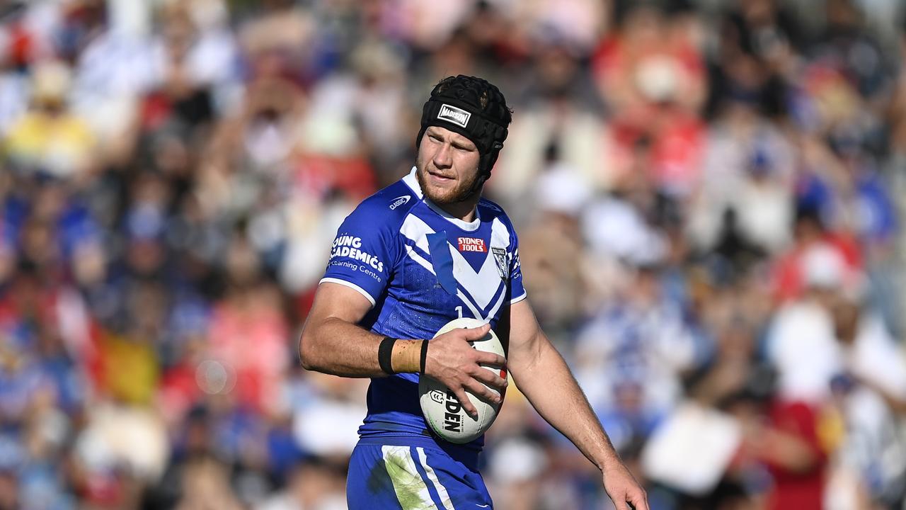 What do the Bulldogs do with Matt Burton? (Photo by Ian Hitchcock/Getty Images)