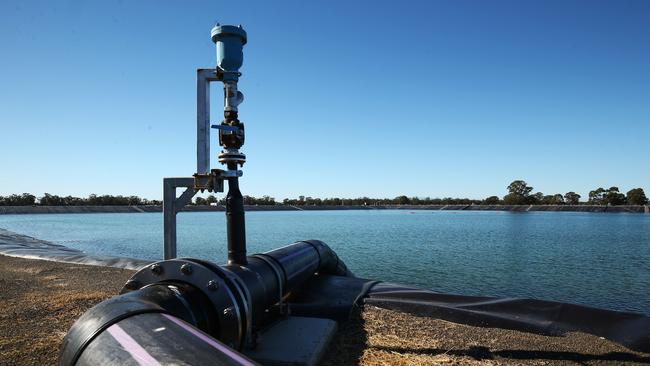 A pipe runs into a holding pond at Santos’ Narrabri gas project in northwest NSW.