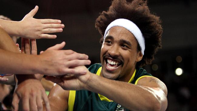 CJ Bruton after Australia’s win in the gold medal match at the 2006 Commonwealth Games in Melbourne.
