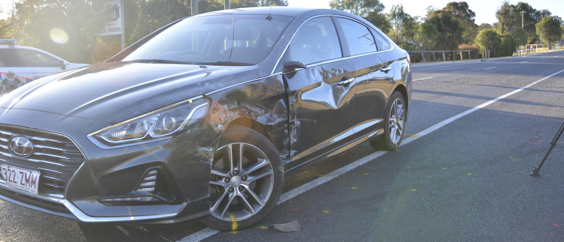 Four police officers have been injured, one seriously, after they were struck by a stolen Hino Series 300 truck north of Toowoomba. May 25, 2023.