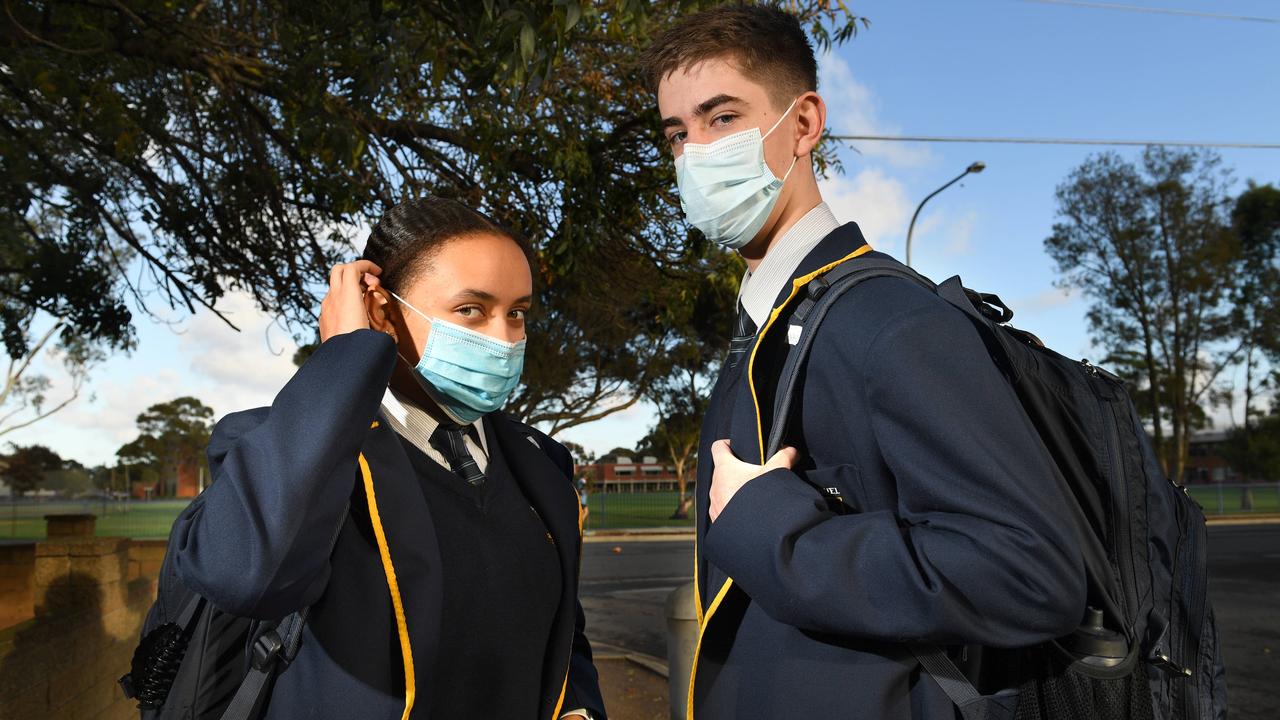 Students Jorja and Mackenzie on the way to school, where they will have to wear masks. Picture: Tricia Watkinson