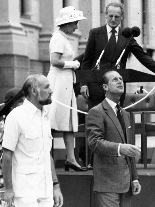 Adelaide Festival Centre Trust director Anthony Steel, Prince Philip, the Queen and Lord Mayor of Adelaide John Roche on podium at official opening of the Adelaide Festival Centre southern plaza and Hajek sculptures.