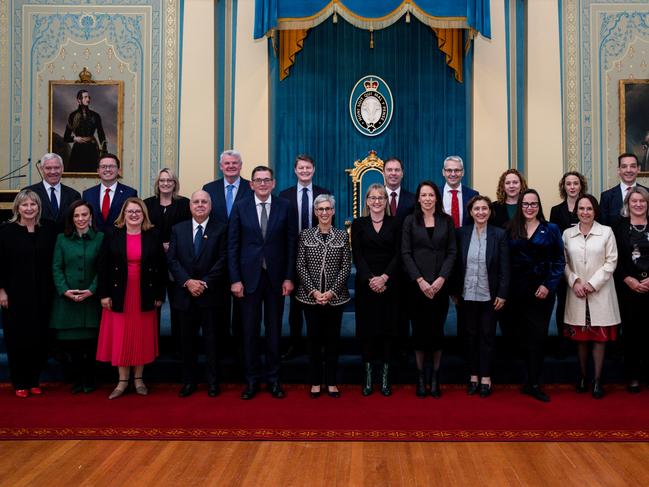 Back row from left: Steve McGhie MP, Anthony Carbines MP, Ros Spence MP, Shaun Leane MP, Ben Carroll MP, Colin Brooks MP, Danny Pearson MP, Melissa Horne MP, Gabrielle Williams MP, Steve Dimopoulos MP Front row from left: Gayle Tierney MP, Lizzie Blandthorn MP, Natalie Hutchins MP, Tim Pallas MP, Daniel Andrews Premier of Victoria, Governor Linda Dessau, Jacinta Allan Deputy Premier, Jaclyn Symes MP, Lily D’Ambrosio MP, Harriet Shing MP, Jaala Pulford MP, Ingrid Stitt MP and Mary-Anne Thomas MP, pose for a group photo during a swearing-in ceremony for new Victorian government ministers at Government House in Melbourne.