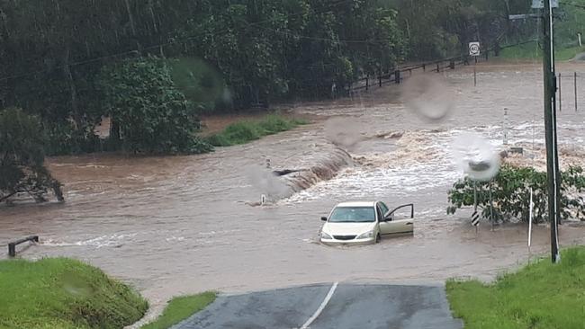 A submerged car on the Causeway at Clagiraba Road on the Gold Coast. Picture: Christian Harvey