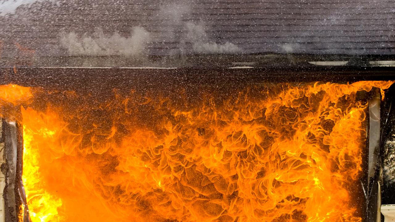 Fireys battle double garage blaze in Pakenham