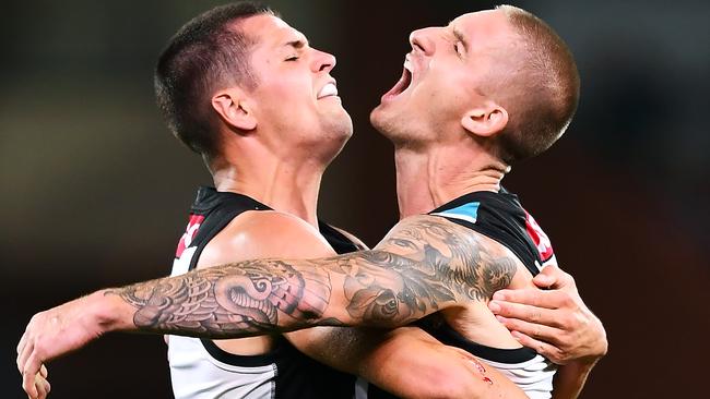 Hamish Hartlett and Ryan Burton celebrate a memorable victory. Picture: Getty Images