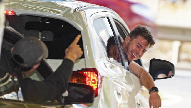 Jack Higgins of the Richmond Tigers Football Club leaves in his car after being tested for coronavirus at Marvel Stadium on Wednesday Picture: AAP