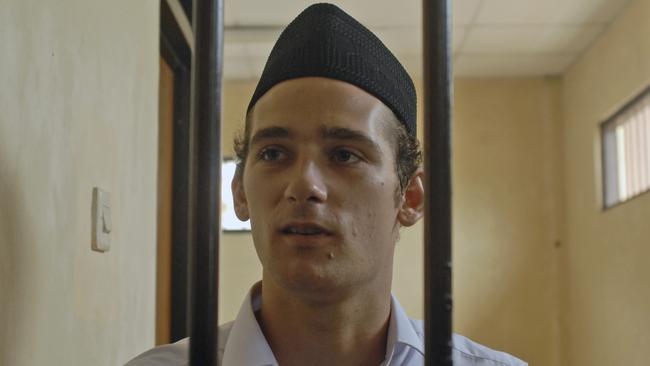 Jake Drage yesterday in a holding cell before the start of his trial in Cibadak district court, West Java.