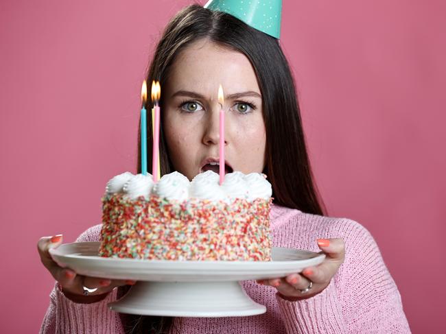 Lucy Brown, 23, is disappointed in the rising price of cakeage at restaurants. Pics Tara Croser.