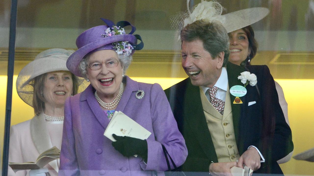 Queen Elizabeth II was elated in 2013 with racing bloodstock king John Warren after her horse Estimate win the Gold Cup on Ladies Day at Royal Ascot. Picture: Mark Cuthbert/Getty