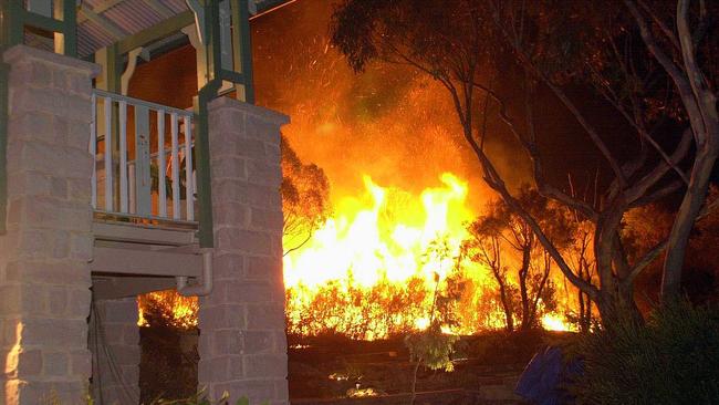 A busfire at Ingleside in January 2001. Picture: John Grainger