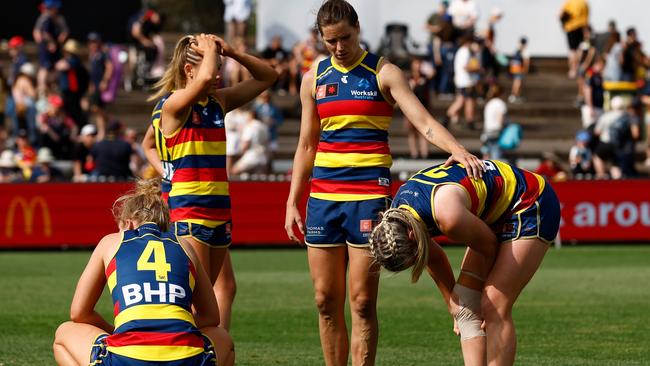 ADELAIDE, AUSTRALIA – NOVEMBER 11: The Crows look dejected after a loss during the 2023 AFLW First Qualifying Final match between The Adelaide Crows and The Brisbane Lions at Norwood Oval on November 11, 2023 in Adelaide, Australia. (Photo by Michael Willson/AFL Photos via Getty Images)