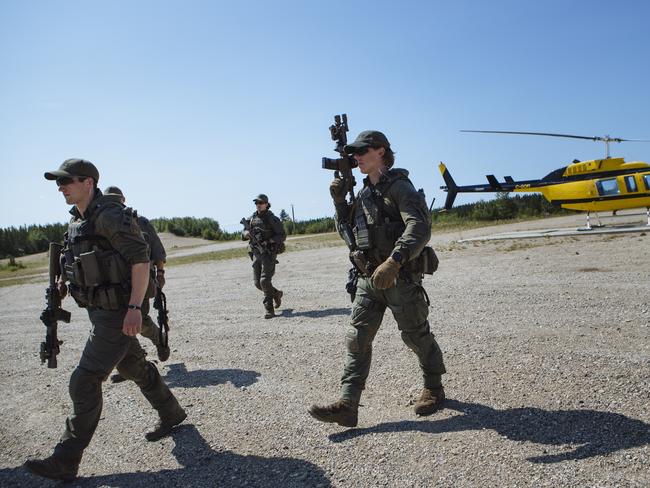 Last night, police started broadening their search again, moving an emergency response team back to Gillam, where it has been based for several day. Picture: Angus Mordant for News Corp Australia