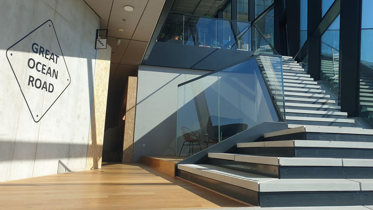 Workers are encouraged to use the stairs at Booking.com’s new HQ. Picture: Amber Plum