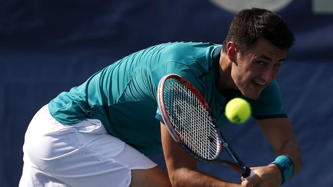 Bernard Tomic has been knocked out of the Toronto Masters.