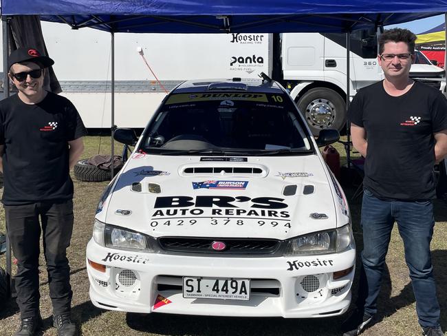 Tasmanians Bodie Reading (Left) and Mark Young (Right) stand in front of their #10 Carver Mechanical Subaru WRX at Gympie Racecourse July 21, 2023.