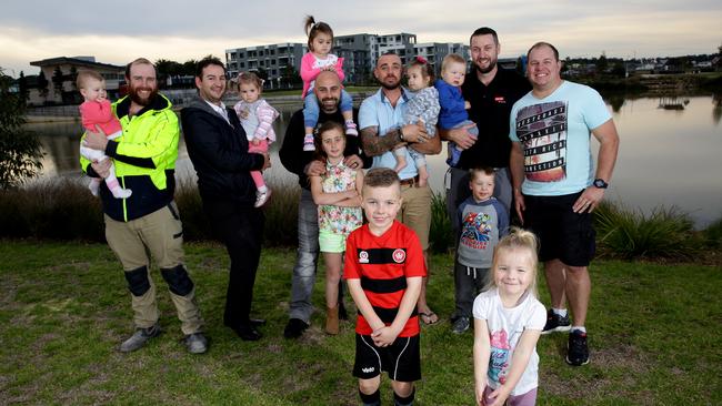 Jordan Springs resident Russ Thomas has set up a Facebook group called ‘Jordan Springs Dads’. He is pictured with Poppy, Nathan McDonald with Sarah, James Grindrod with Hayley, Enzo Montana with Ava and Allegra, Tim Smith with Brodie and Tyler and Rudi Matosa with Emily and Oscar.