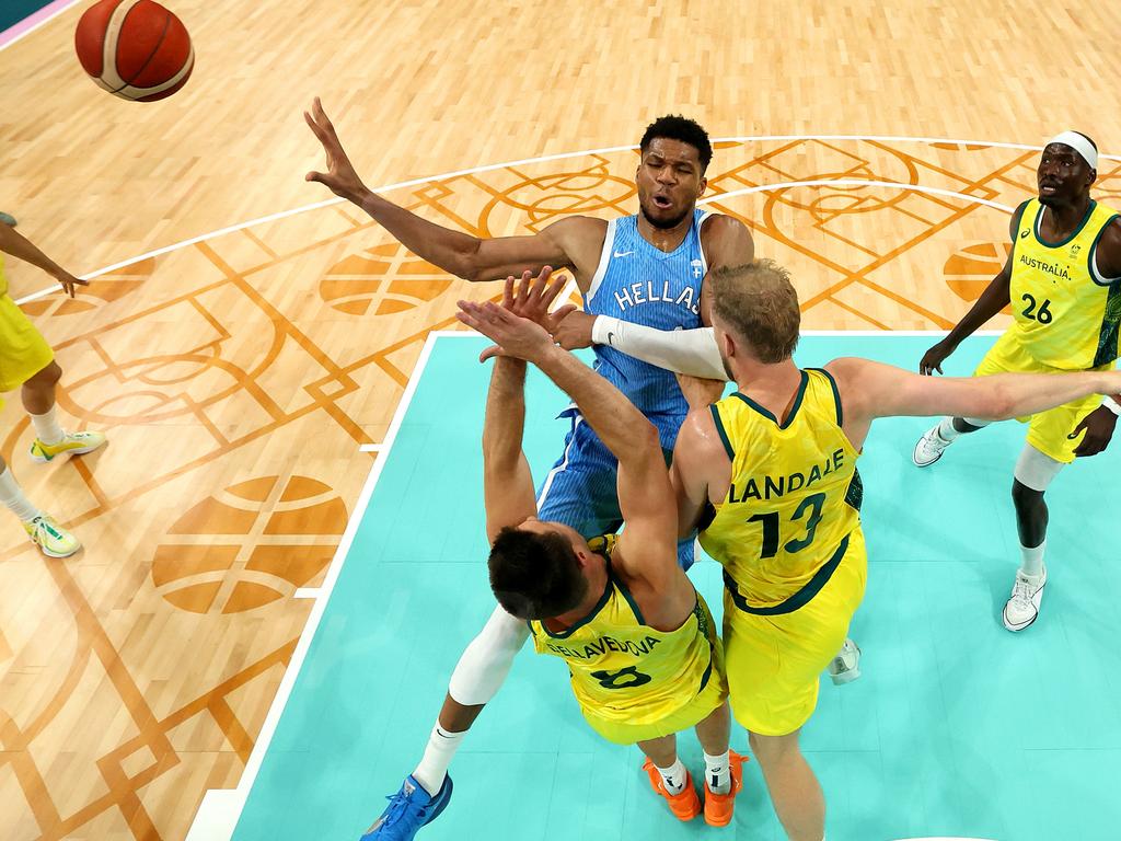 Matthew Dellavedova and Jock Landale try to halt ‘The Greek Freak’. Picture: Getty Images.