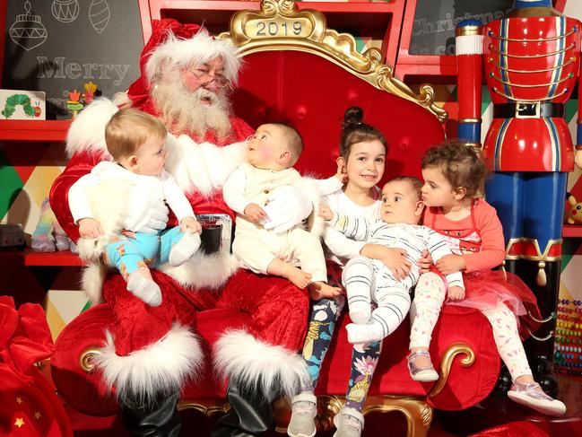 Santa with Ivar, Cristian, Sofia, Harry and Layla at Chirnside Park Shopping Centre. Picture: Hamish Blair