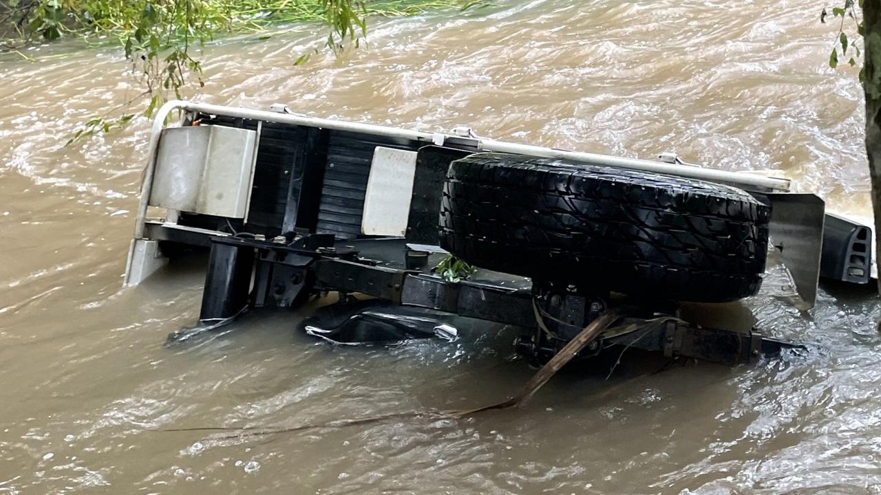 The submerged vehicle in Surprise Creek Road at Mount Ossa. A Calen woman was found inside the vehicle after it was swept off a flooded roadway about 5am on Wednesday, May 11, 2022. Picture: Max O'Driscoll