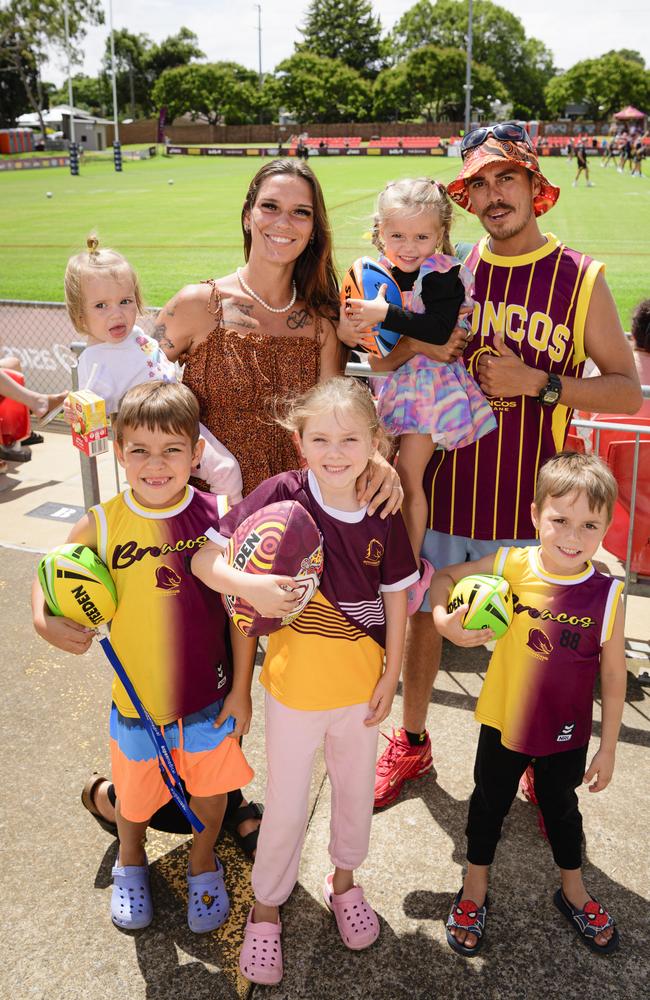 At the Brisbane Broncos Captain's Run and Toowoomba Fan Day are (back) Abbie Pullen holding Valerie Talbott with Joshua Talbott holding Octavia Talbott, and (front, from left) Braxton Pullen, Savannah Talbott and Dexter Talbott at Toowoomba Sports Ground, Saturday, February 15, 2025. Picture: Kevin Farmer