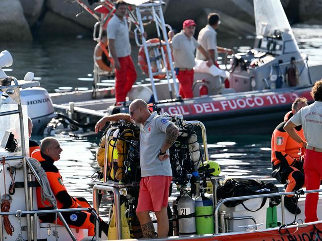 Divers of the Vigili del Fuoco, the Italian Corps. of Firefighters leave Porticello harbor near Palermo four days after the British-flagged luxury yacht Bayesian sank. Picture: Stanley International, and his wife Judy. Picture: Alberto Pizzoli / AFP