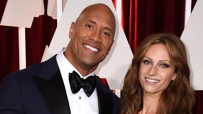 HOLLYWOOD, CA - FEBRUARY 22: Actor Dwayne 'The Rock' Johnson (L) and singer Lauren Hashian the 87th Annual Academy Awards at Hollywood & Highland Center on February 22, 2015 in Hollywood, California. (Photo by Frazer Harrison/Getty Images)