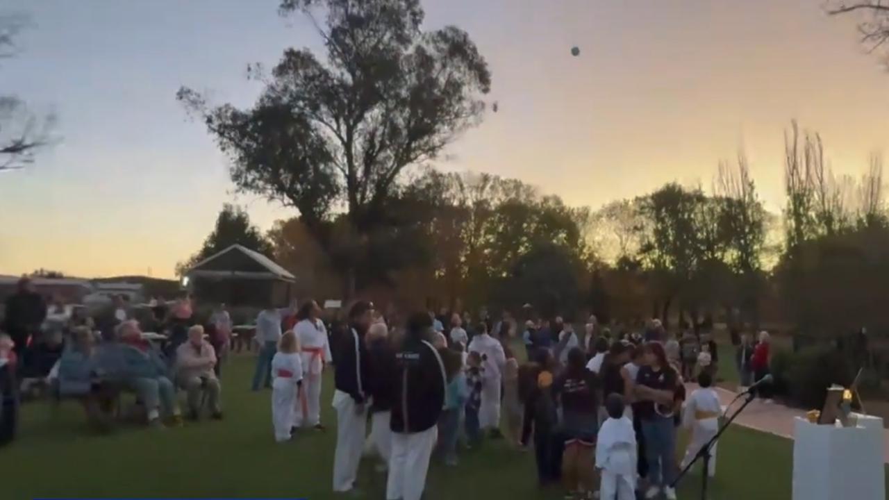 A vigil was held for brother Max Johnson, 7, and Sam, 6, in Coonbarabran after they were allegedly killed by their grandmother. Picture: 9News