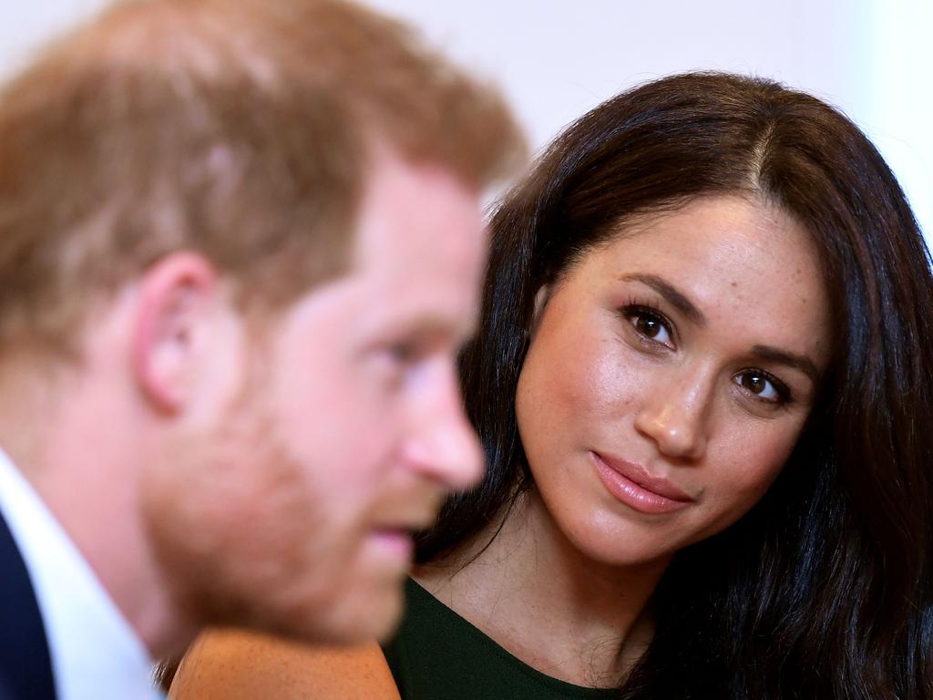 Harry and Meghan will officially exit the royal family on March 31. Picture: TOBY MELVILLE / POOL / AFP