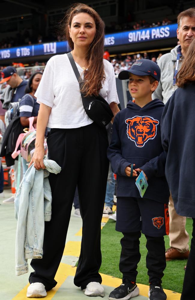 Mila Kunis and son Dimitri, 7, at the game. Picture: Michael Reaves/Getty Images