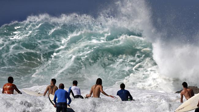 Surfers enjoying the large swell at Snapper Rocks during Winston. Picture: Jerad Williams