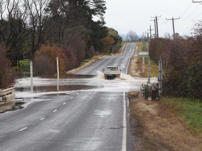 A flooded road at Carrick near Launceston. Picture: BRUCE MOUNSTER