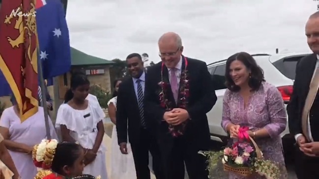 Scott and Jenny Morrison arriving at Sri Lankan temple near Melbourne