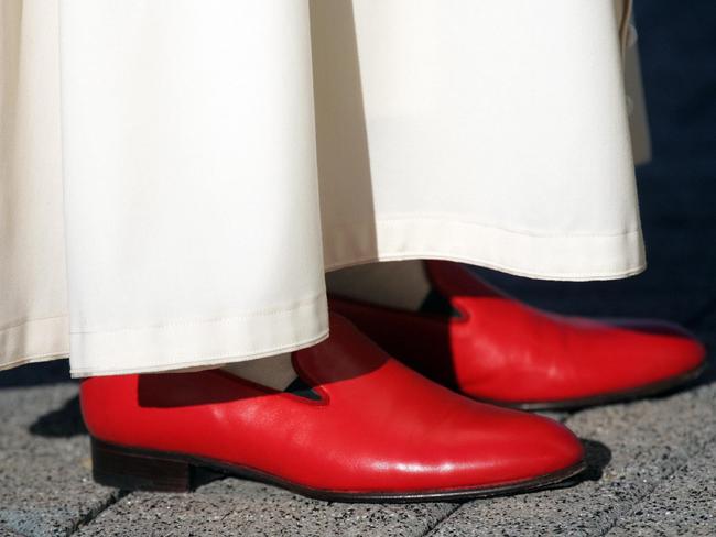 Arriving in brilliant red shoes at the Pope John Paul II Cultural Center in Washington, DC, 2008. Picture: AFP