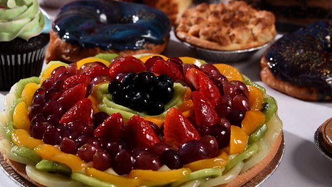 Fruit flans, doughnuts, apple crumble ... and yes, it’s all vegan. Photo: Steve Holland