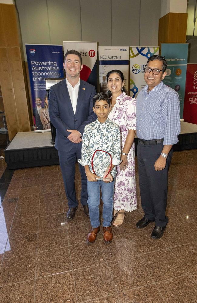 Minister Josh Burgoyne with Samuel Palakal and his proud parents.