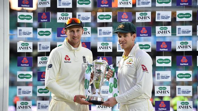 England's captain Joe Root (L) and Australia's Tim Paine shared the Ashes trophy after the 2019 series. Picture: Getty